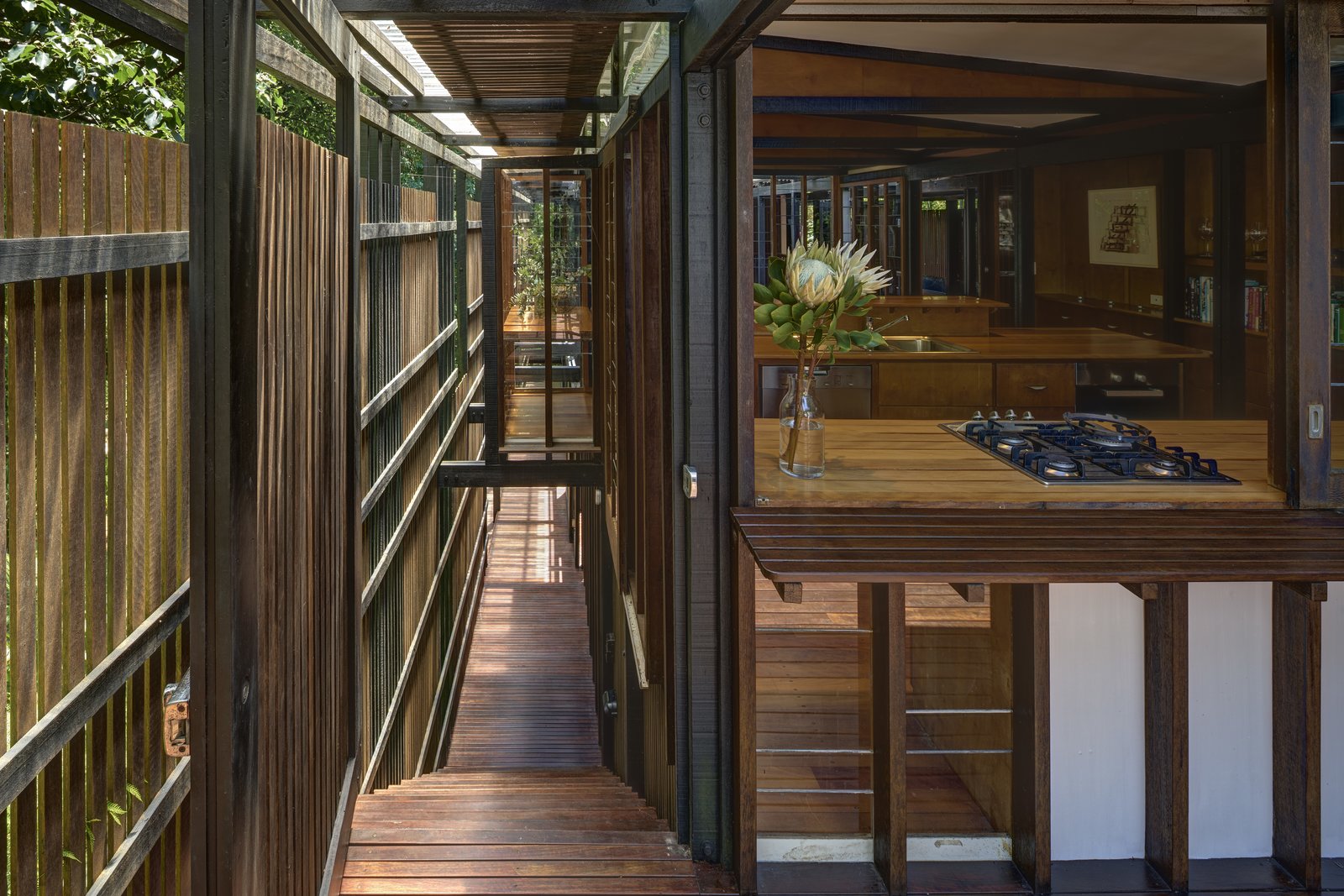 A hallway that runs the length of each pavilion helps improve circulation, and provides storage areas.