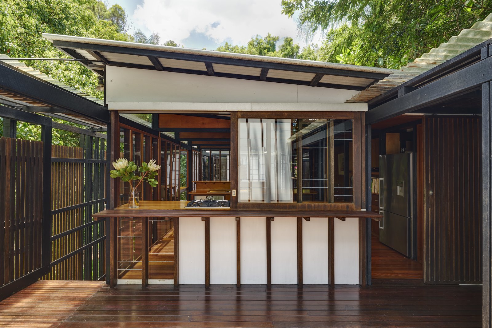 The vertical Japanese slat details imbue the house with a Japanese, Zen-inspired aesthetic.
