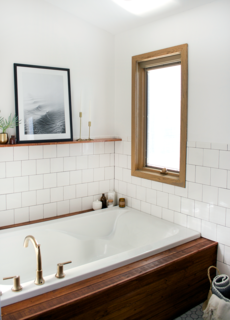 For a while, Goldman could not decide between free standing bathtub and a built-it, but was sold on a built-in when she saw inspiration photos of wood panelled tubs.