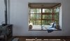 Modern home with Windows and Wood. In each room, the toilet walls are finished in ‘kadappah’ – a black stone cut in to tiles. Photo 11 of The Kumaon