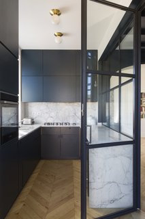Best 60 Modern Kitchen Backsplashes Design Photos And Ideas Dwell Crittall Style Windows Encase The Sleek And Modern Kitchen In This Room Deep