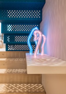 Ulanowski worked with a number of talented artisans and fabricators to create the many bespoke items such as the staircase, glass art, chairs, bed frames, and tableware.