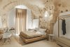 Modern home with Bedroom, Floor Lighting, Night Stands, Table Lighting, Bed, Chair, and Terrazzo Floor. The plaster was added to sections where the masonry was compromised. Photo of La Dimora Di Matello