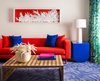 Modern home with Living Room, Carpet Floor, Table Lighting, Coffee Tables, Sofa, and End Tables. Three color concepts—pink, teal and blue—were used to add variety to the guest room interiors. Photo 11 of Shoreline Hotel Waikiki