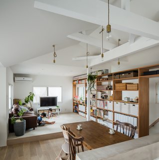 Additional windows and open shelving help Suita House in Osaka feel airy and modern. 