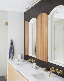 Light fixture from Allied Maker and Bocci; custom-made white oak "shutter" cabinets; plumbing fixtures by California Faucets. 