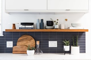 They also added a floating teak shelf from Semihandmade, which was a pretty close match to the Lauan wood paneling in the rest of the house. 