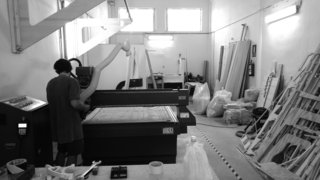 We get a view of the factory processing of the plywood.