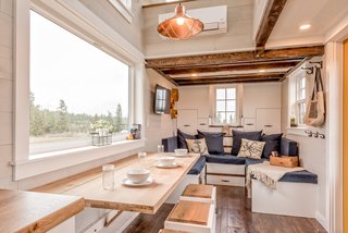 The dining table can be folded in three sections for different uses.