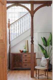 The designers/owners kept the home's original Arts and Crafts style posts.