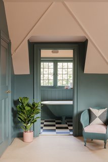 A delightfully decorated bathroom in the attic level.