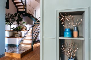 Dried flowers in colorful pots adorn the shelves.