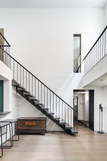 Within the home, the ceiling heights range from 11 to 21 feet. 