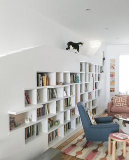 Living Room, Stools, Bookcase, Recessed Lighting, and Chair This Brooklyn home has a bookcase with a built-in catwalk. 