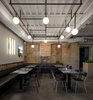 Modern home with Dining Room, Chair, Table, and Pendant Lighting. The frieze supporting the bar in Belyi Shum Cafe features bricks made in the same year as the oldest building. Photo 20 of BURSA Hotel