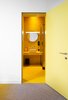 Modern home with Wall Lighting. A bright yellow bathroom. Photo 17 of BURSA Hotel