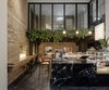 Modern home with Dining Room, Stools, Table, Dark Hardwood Floor, and Pendant Lighting. The hotel's cafe. Photo 8 of BURSA Hotel