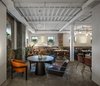 Modern home with Dining Room, Pendant Lighting, Chair, Table, and Concrete Floor. BURSA Hotel's Beliy Shum restaurant. Photo 7 of BURSA Hotel