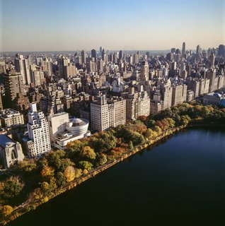 Solomon R. Guggenheim Museum, view looking eastward to Fifth Avenue with Central Park reservoir in foreground.