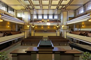 Unity Temple, interior view showing eastern alcove of Unity House, and balcony above.