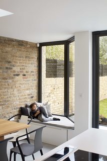 A reading bench looks out to the garden.