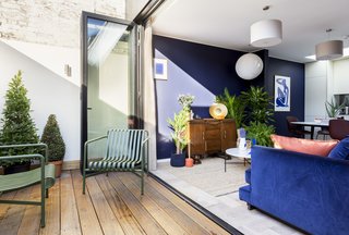 Natural light brightens the living areas when the glazed doors to the terrace are opened.