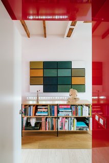 At the entrance of the house is a painting by artist Francisco Roa. 