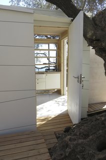 Locally sourced ceramic tiles are used in the kitchenette, all designed and built by Echo Living.