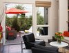 Modern home with Bench, Concrete Floor, Outdoor, Back Yard, Shrubs, Small Patio, Porch, Deck, and Concrete Patio, Porch, Deck. Seamless transition between the entry and rear yard Photo 2 of Healdsburg Makeover