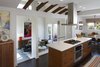 Modern home with Kitchen, Engineered Quartz Counter, Microwave, Wood Cabinet, Dark Hardwood Floor, Wall Oven, and Recessed Lighting. Kitchen and flexible entry space Photo 6 of Healdsburg Makeover