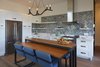 Modern home with Front Yard, Wire Fences, Wall, Gardens, Large Patio, Porch, Deck, Metal Patio, Porch, Deck, Wood Patio, Porch, Deck, and Kitchen. Kitchen with custom table and moveable prep counter Photo 5 of Modern Vineyard Farmhouse