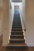 Modern home with Front Yard, Gardens, Large Patio, Porch, Deck, Metal Patio, Porch, Deck, Wood Patio, Porch, Deck, Wire Fences, Wall, Closet Storage Type, Under Stairs Storage Type, and Staircase. Stairway with recessed LED lighting Photo 7 of Modern Vineyard Farmhouse