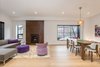 Living room and dining room benefit from big window openings that bring light in. Photo 2 of Manor Road house modern home