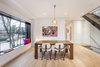 Dining room area with black oak window seat. Photo 3 of Manor Road house modern home