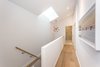 Staircase with skylight. Photo 11 of Manor Road house modern home