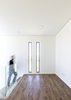 vertical windows - As soon as you arrive on the second floor plan by the stairs, there is the space of a small home office. Photo 17 of SG House modern home