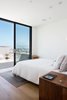 Modern home with Bedroom, Bed, and Medium Hardwood Floor. Master bedroom Photo 12 of 27th Street - Noe Valley