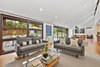 Modern home with Living Room, Coffee Tables, Pendant Lighting, Sofa, Ceiling Lighting, and Medium Hardwood Floor. Living room Photo 5 of Portola Valley