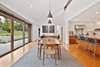 Modern home with Dining Room, Chair, Ceiling Lighting, Table, Medium Hardwood Floor, and Pendant Lighting. Dining room Photo 9 of Portola Valley