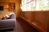 Modern home with Living Room, Bookcase, Media Cabinet, Shelves, Recessed Lighting, and Carpet Floor. Built-in bookcases Photo 5 of Alamo