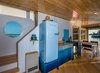 Modern home with Medium Hardwood Floor, Engineered Quartz Counter, and Colorful Cabinet. Open Air Kitchen Photo 15 of The Barge Yacht