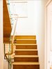 Modern home with Staircase, Wood Tread, and Glass Railing. Central Stair Photo 3 of Laidley Cottage