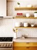 Modern home with Kitchen, Range, Porcelain Tile Backsplashe, White Cabinet, and Concrete Counter. Kitchen detail Photo 7 of Laidley Cottage