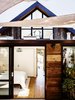 Modern home with Outdoor, Wood Patio, Porch, Deck, and Small Patio, Porch, Deck. Master bedroom with outdoor space Photo 8 of Laidley Cottage