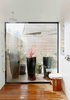 Master bath with views to outdoor space Photo 11 of Laidley Cottage modern home