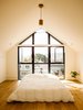 Modern home with Bedroom, Pendant Lighting, and Bed. guest room Photo 13 of Laidley Cottage