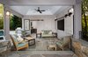 This covered flagstone patio features a flatscreen television, wifi, and access to the kitchen. Sliding barn door-style panels can conceal the tv when it is not in use. A coordinating door closes off the kitchen entry. Photo 2 of Outdoor Kitchen and Patio modern home