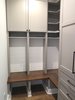 Modern home with Storage Room, Shelves Storage Type, and Closet Storage Type. Custom designed storage lockers help keep backpacks and outdoor shoes and clothing organized. Photo 11 of Commercial Garage Converted