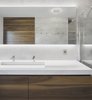 Modern home with Bath Room, Undermount Sink, Ceiling Lighting, and Wall Lighting. In modern bathroom vanities, rectangular shapes abound. The shape is showcased on this geometric vanity, where the drawers, countertop, sink, and knobs are all rectangular. Photo 9 of r3R