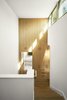 Stair tower that connects existing structure to new. Photo 13 of Airole Way Residence modern home